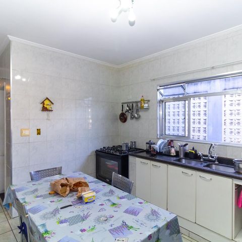 Casa à venda com 220m², 4 quartos e 4 vagas Casa à venda com 220m², 4 quartos e 4 vagasCozinha