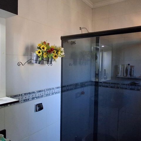 Casa à venda com 298m², 4 quartos e 3 vagasBanheiro