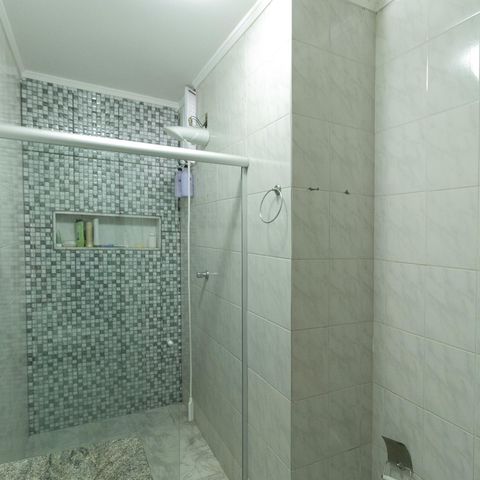 Casa à venda com 318m², 4 quartos e 3 vagasBanheiro de Serviço