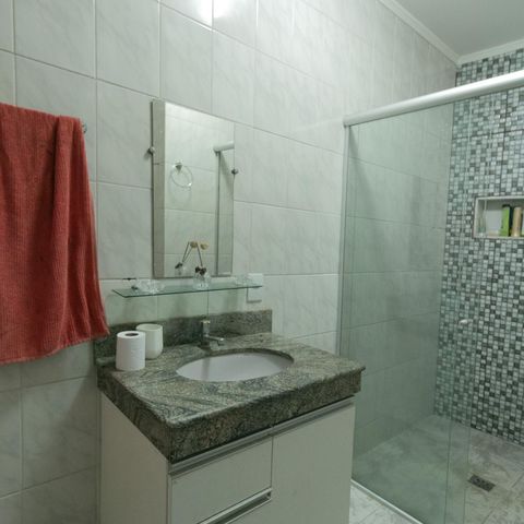 Casa à venda com 318m², 4 quartos e 3 vagasBanheiro de Serviço
