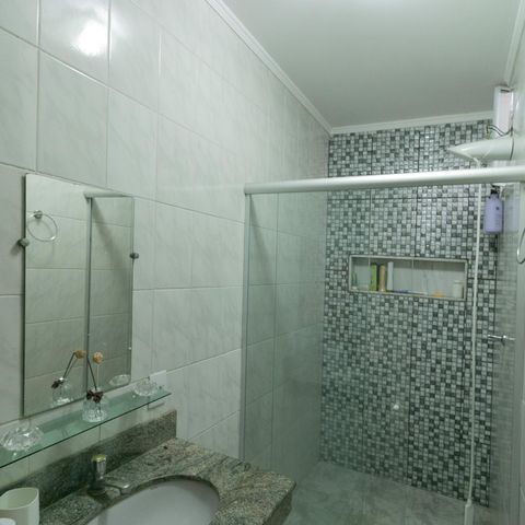 Casa à venda com 318m², 4 quartos e 3 vagasBanheiro de Serviço