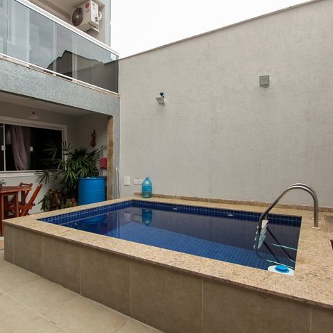 Casa de condomínio à venda com 300m², 4 quartos e 4 vagas Casa de condomínio à venda com 300m², 4 quartos e 4 vagasQuintal da entrada
