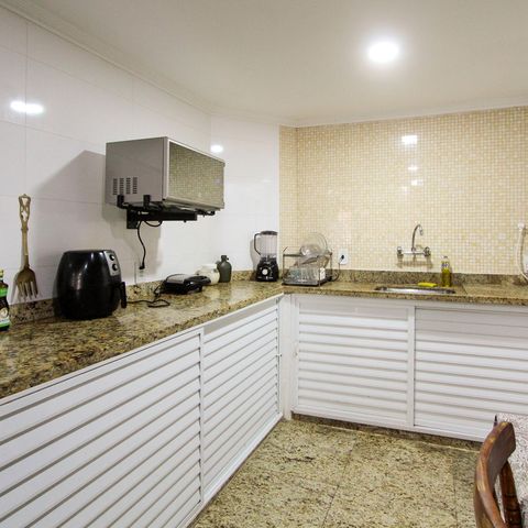 Casa de condomínio à venda com 300m², 4 quartos e 4 vagas Casa de condomínio à venda com 300m², 4 quartos e 4 vagasCozinha