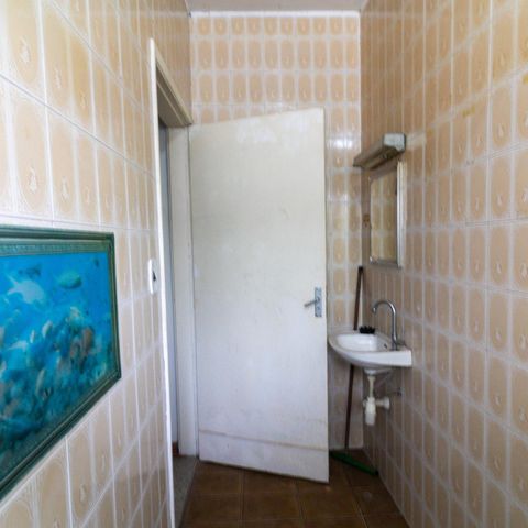 Casa à venda com 165m², 3 quartos e 2 vagas Casa à venda com 165m², 3 quartos e 2 vagasBanheiro Escritório