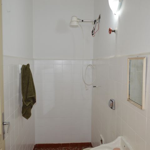Casa de condomínio à venda com 110m², 3 quartos e 2 vagasBanheiro de Serviço