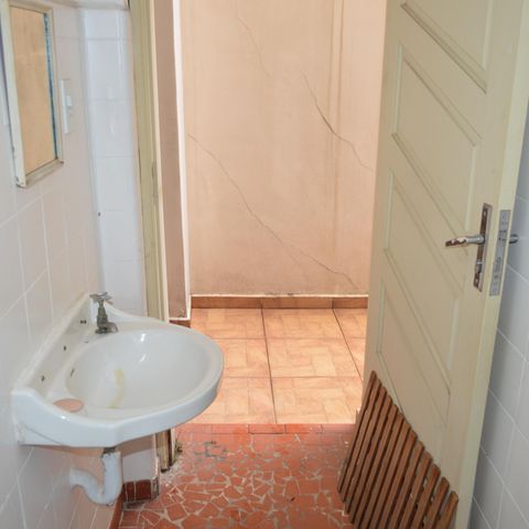 Casa de condomínio à venda com 110m², 3 quartos e 2 vagasBanheiro de Serviço