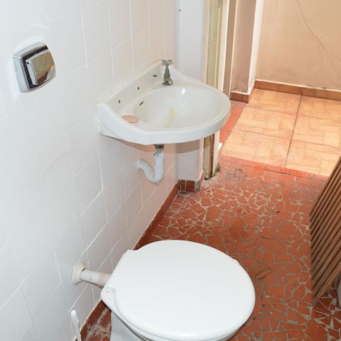 Casa de condomínio à venda com 110m², 3 quartos e 2 vagasBanheiro de Serviço