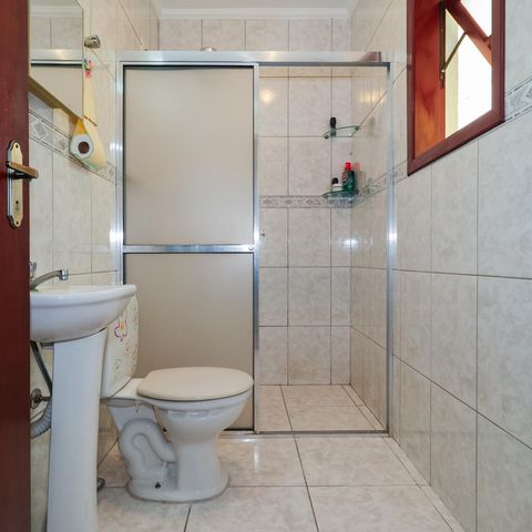 Casa à venda com 143m², 4 quartos e 2 vagas Casa à venda com 143m², 4 quartos e 2 vagasBanheiro da Suíte 2