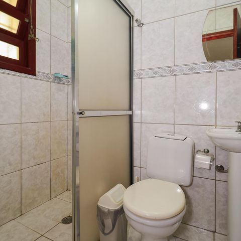 Casa à venda com 143m², 4 quartos e 2 vagas Casa à venda com 143m², 4 quartos e 2 vagasBanheiro da Suíte 1