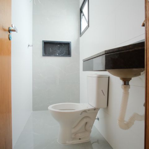 Casa à venda com 130m², 3 quartos e 2 vagasBanheiro da Suíte 1