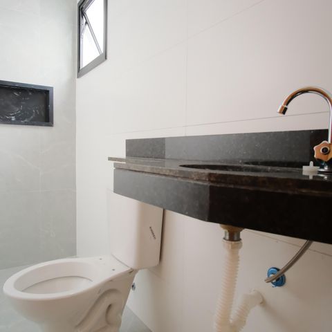 Casa à venda com 130m², 3 quartos e 2 vagasBanheiro da Suíte 1