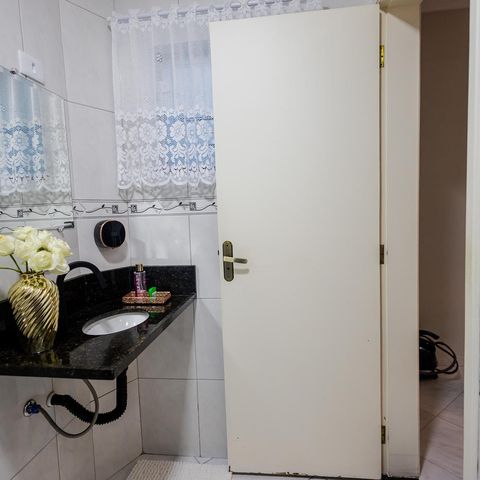 Casa à venda com 75m², 2 quartos e 2 vagas Casa à venda com 75m², 2 quartos e 2 vagasLavabo da Sala
