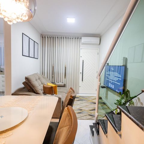 Casa à venda com 75m², 2 quartos e 2 vagas Casa à venda com 75m², 2 quartos e 2 vagasSala