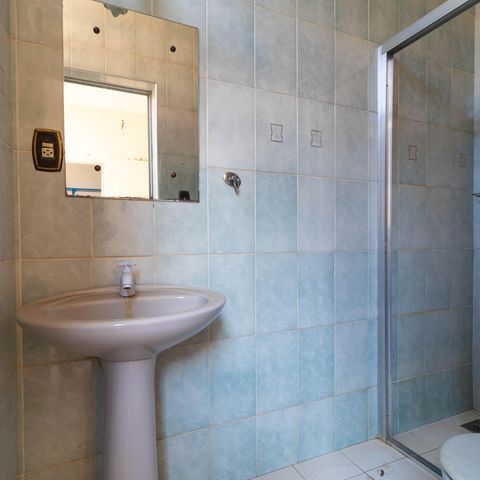 Casa para alugar com 450m², 5 quartos e 4 vagasBanheiro do Quintal