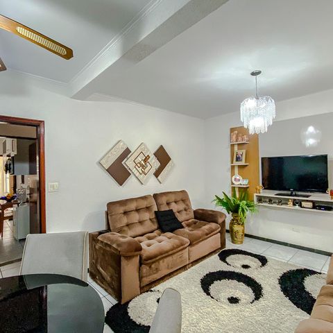 Casa à venda com 95m², 2 quartos e 2 vagasSala