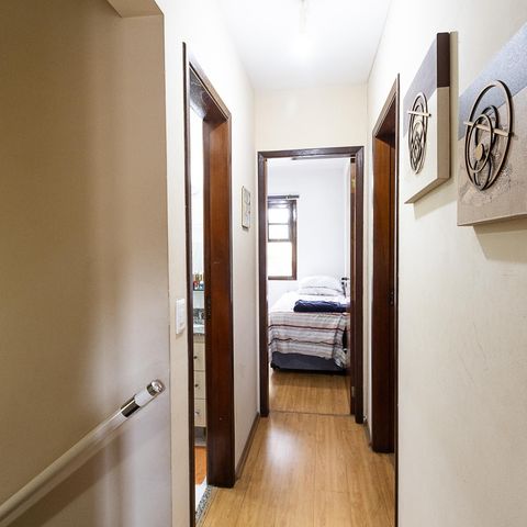 Casa à venda com 86m², 3 quartos e 2 vagas Casa à venda com 86m², 3 quartos e 2 vagasCorredor