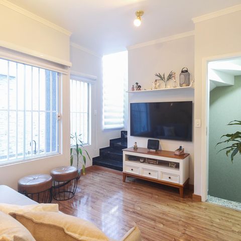 Casa de condomínio à venda com 126m², 3 quartos e 2 vagas Casa de condomínio à venda com 126m², 3 quartos e 2 vagasSala