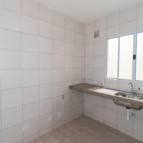 Casa à venda com 75m², 2 quartos e 2 vagas Casa à venda com 75m², 2 quartos e 2 vagasCozinha