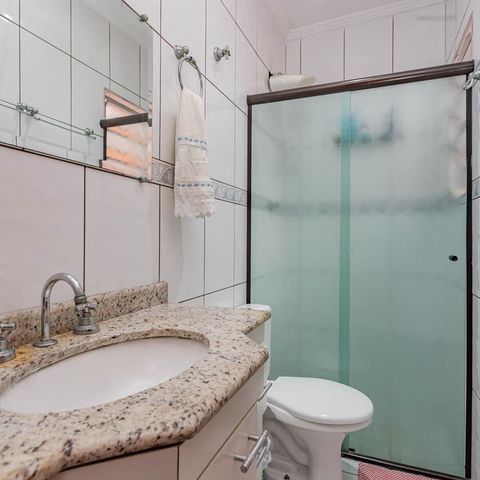 Casa à venda com 110m², 3 quartos e 2 vagasBanheiro da Suíte