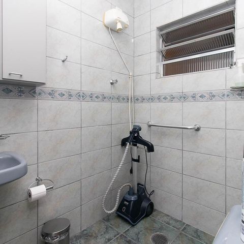 Casa à venda com 149m², 3 quartos e 2 vagas Casa à venda com 149m², 3 quartos e 2 vagasBanheiro de Serviço