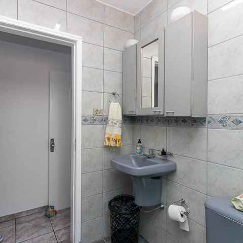 Casa à venda com 149m², 3 quartos e 2 vagas Casa à venda com 149m², 3 quartos e 2 vagasBanheiro