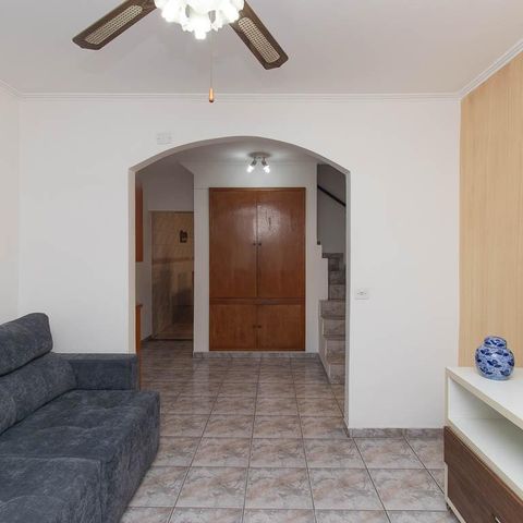 Casa à venda com 149m², 3 quartos e 2 vagas Casa à venda com 149m², 3 quartos e 2 vagasSala