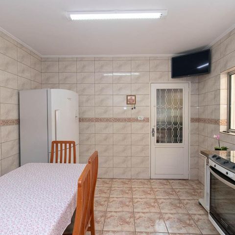 Casa à venda com 149m², 3 quartos e 2 vagas Casa à venda com 149m², 3 quartos e 2 vagasCozinha