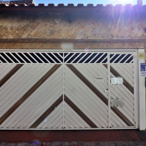 Casa à venda com 145m², 3 quartos e 2 vagasFachada e Placa