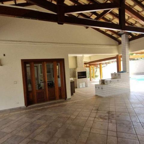 Casa de condomínio à venda com 570m², 5 quartos e 6 vagas