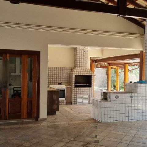 Casa de condomínio à venda com 570m², 5 quartos e 6 vagas