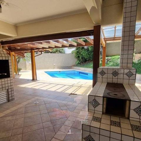 Casa de condomínio à venda com 570m², 5 quartos e 6 vagas