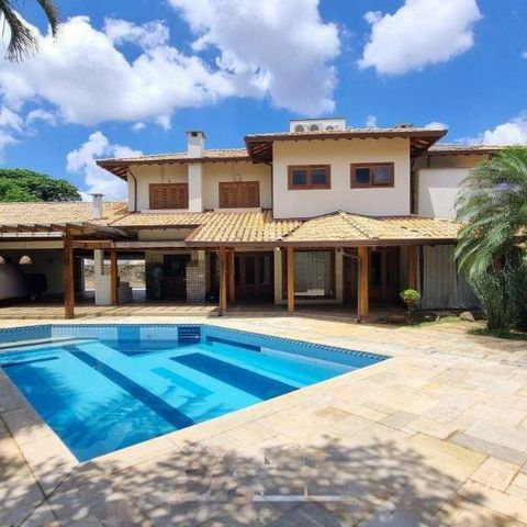 Casa de condomínio à venda com 570m², 5 quartos e 6 vagas