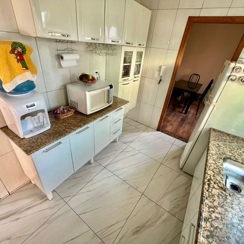 Casa à venda com 180m², 4 quartos e 4 vagas Casa à venda com 180m², 4 quartos e 4 vagasCozinha