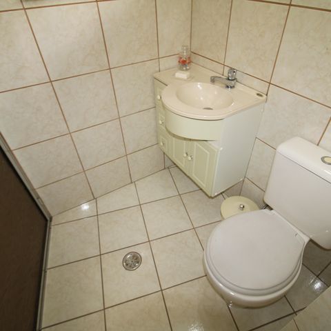 Casa à venda com 116m², 2 quartos e 4 vagasBanheiro de Serviço