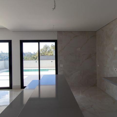 Casa de condomínio para alugar com 380m², 4 quartos e 4 vagasCozinha