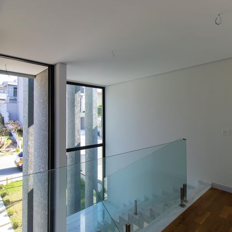 Casa de condomínio para alugar com 380m², 4 quartos e 4 vagasCorredor andar superior