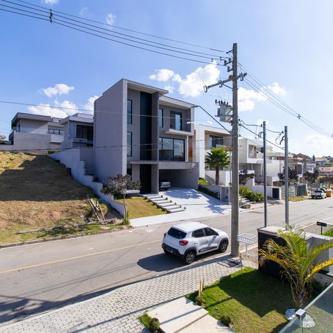 Casa de condomínio para alugar com 380m², 4 quartos e 4 vagasVista da Varanda da Suíte 1
