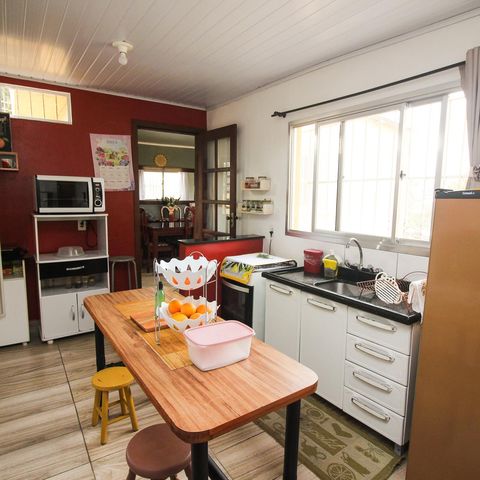 Casa à venda com 130m², 3 quartos e 3 vagas Casa à venda com 130m², 3 quartos e 3 vagasCozinha