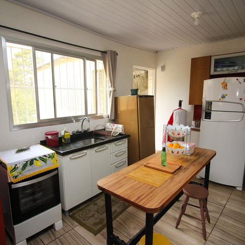 Casa à venda com 130m², 3 quartos e 3 vagas Casa à venda com 130m², 3 quartos e 3 vagasCozinha