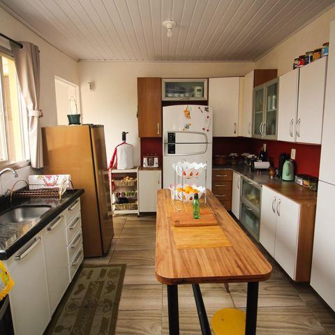 Casa à venda com 130m², 3 quartos e 3 vagas Casa à venda com 130m², 3 quartos e 3 vagasCozinha