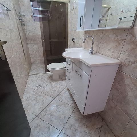 Casa à venda com 96m², 3 quartos e 2 vagasBanheiro