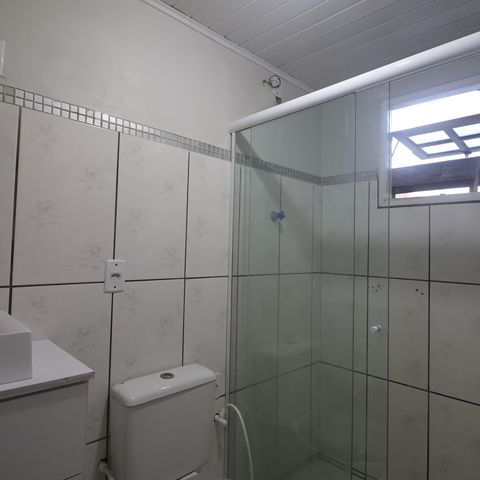 Casa para alugar com 130m², 4 quartos e 2 vagasBanheiro/casa fundos