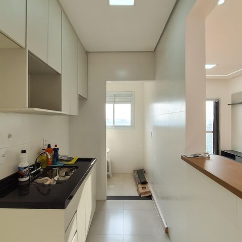 Apartamento à venda com 54m², 2 quartos e 1 vaga Apartamento à venda com 54m², 2 quartos e 1 vagaCozinha e Área de Serviço