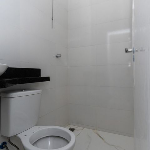 Casa à venda com 90m², 2 quartos e 2 vagasBanheiro da Suite