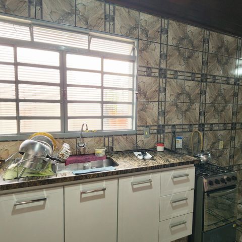 Casa à venda com 125m², 4 quartos e 2 vagas Casa à venda com 125m², 4 quartos e 2 vagasCozinha