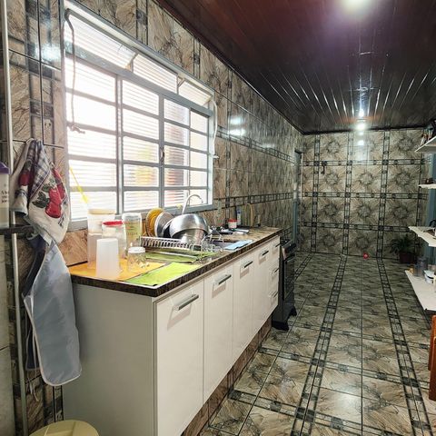 Casa à venda com 125m², 4 quartos e 2 vagas Casa à venda com 125m², 4 quartos e 2 vagasCozinha