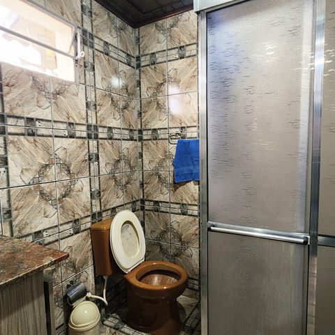 Casa à venda com 125m², 4 quartos e 2 vagas Casa à venda com 125m², 4 quartos e 2 vagasBanheiro da Suíte 1