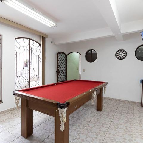 Casa à venda com 309m², 3 quartos e 4 vagas Casa à venda com 309m², 3 quartos e 4 vagasÁrea comum - Sala de Jogos