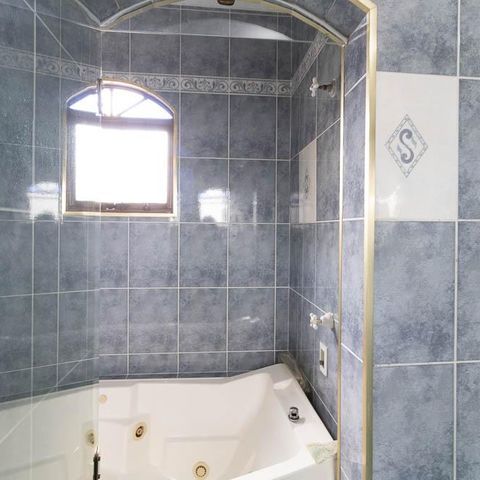 Casa à venda com 309m², 3 quartos e 4 vagas Casa à venda com 309m², 3 quartos e 4 vagasBanheiro da Suíte