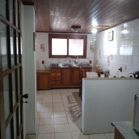 Casa à venda com 200m², 4 quartos e 3 vagas Casa à venda com 200m², 4 quartos e 3 vagasCozinha